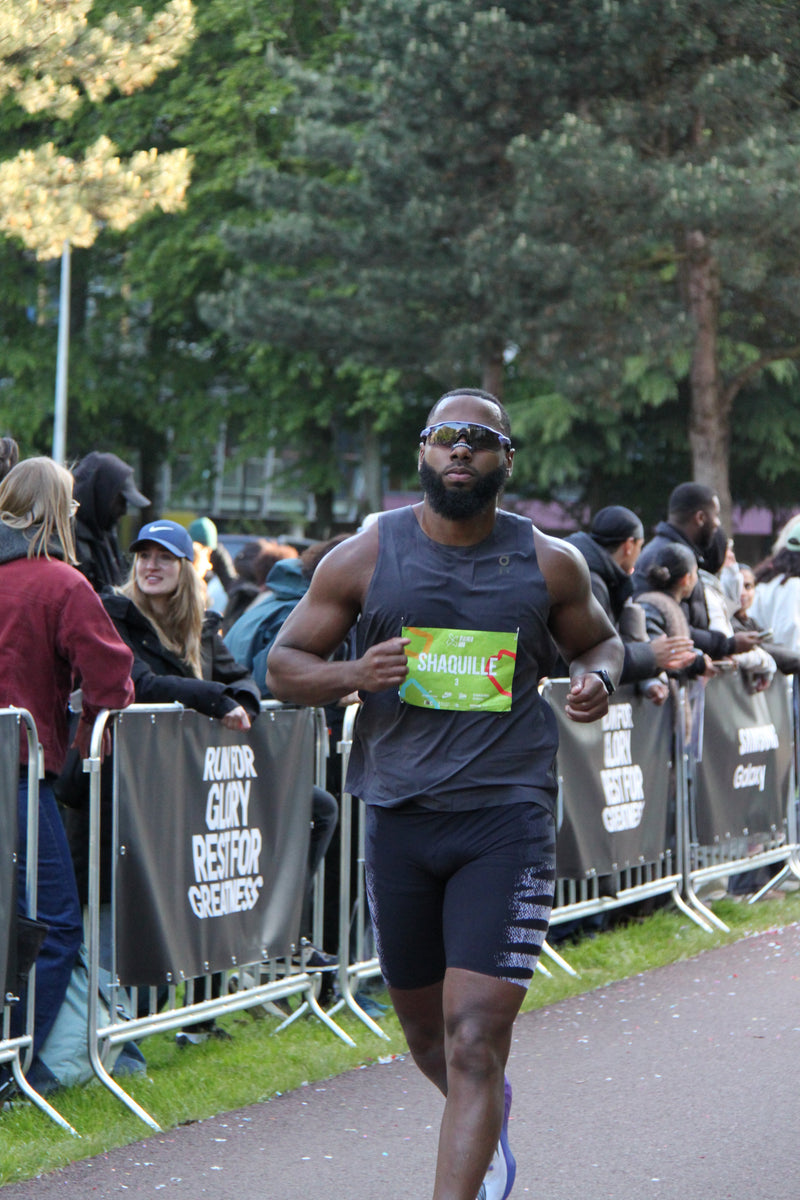 Marathon runner pushing through final kilometres wearing nasal strip